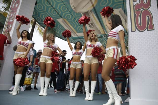 San Francisco 49ers cheerleaders cheer on the crowd during a fan rally.  (AP Photo/Brynn Anderson)