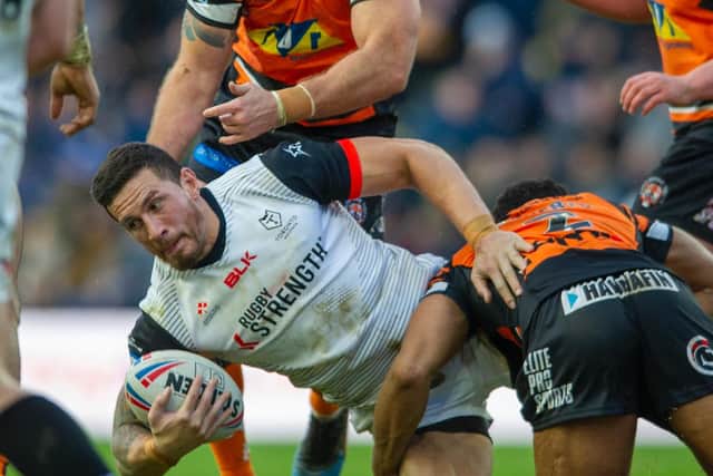 Toronto's Sonny Bill Williams is downed by the Castleford defence, (TONY JOHNSON)