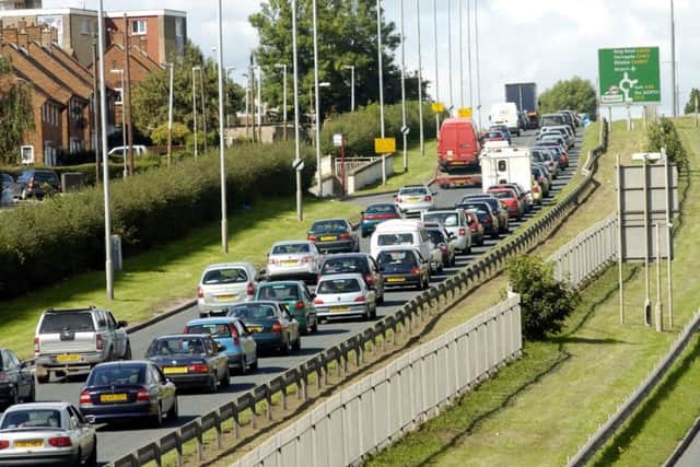 What should be done to reduce congestion in cities like Leeds?