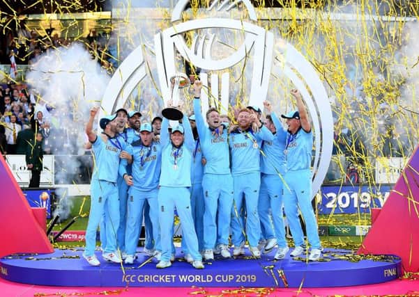 LONDON, ENGLAND - JULY 14:  Eoin Morgan of England celebrates with his team as he lifts the Cricket World Cup trophy at Lord's last summer . Picture: Clive Mason/Getty Images