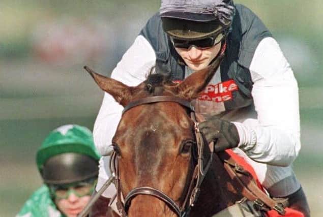 Andrew Thornton and Coll Dawn clear the last in the 1998 Cheltenhal Gold Cup.