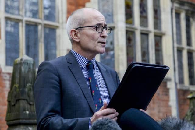 Professor Charlie Jeffrey from The University of York reads a statement outside the Heslington Hall Building on the campus in York following the confirmation of a student from the university contracting the Coronavirus. Danny Lawson/PA Wire