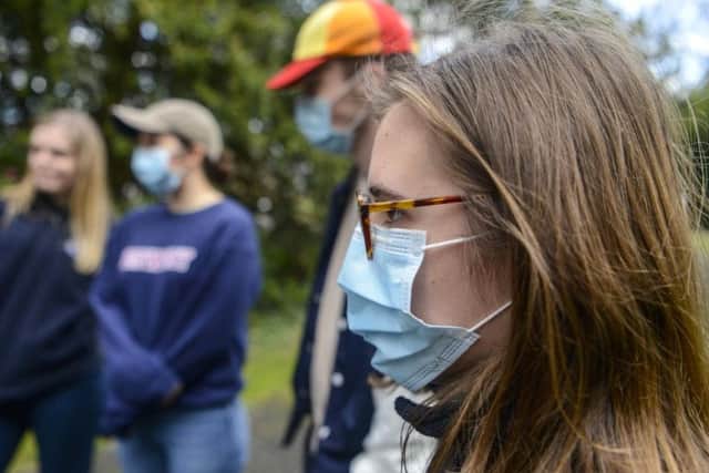 Students wear face masks around campus at The University of York in York. Danny Lawson/PA Wire