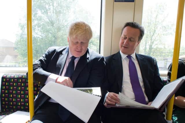 Current Prime Minister Boris Johnson with former Prime Minister David Cameron in 2014 (Photo: Stefan Rousseau/PA Wire)