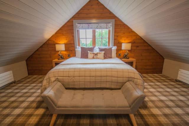 The master bedroom in a lodge at High Oaks Grange