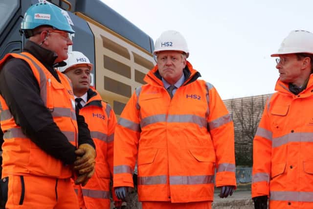 Boris Johnson during a visit to a HS2 construction site near Birmingham after giving high-speed rail the green light.