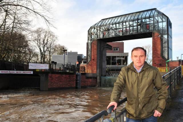 George Eustice MP, Secretary of State for Environment, Food and Rural Affairs at the Foss Barrier in York. Picture Gerard Binks