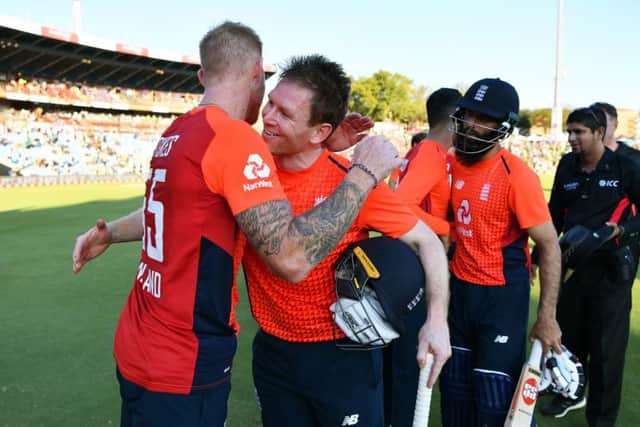 Eoin Morgan of England embraces Ben Stokes after victory during the Third T20 International match between South Africa and England at Supersport Park on February 16. (Picture: Dan Mullan/Getty Images)