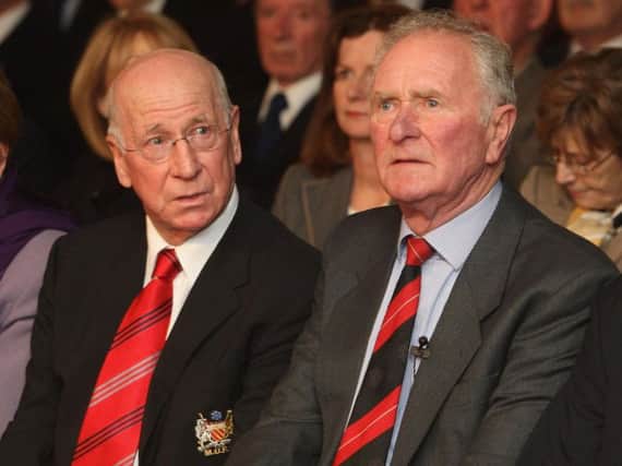 Sir Bobby Charlton, left, and Harry Gregg attending the memorial service to mark the 50th anniversary of the Munich Air Disaster at Old Trafford in Manchester on February 6, 2008.