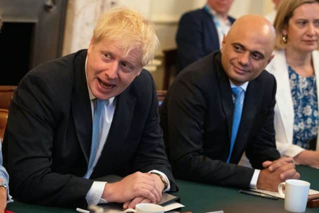 Sajid Javid (right) with Prime Minister Boris Johnson at a Cabinet meeting at Downing Street in London last summer. Picture: Aaron Chown/PA Wire