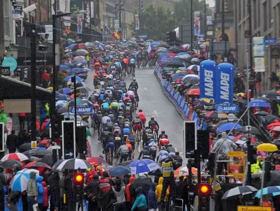 Spectators watch the 2019 UCI Cycling Road World Championship in Harrogate.