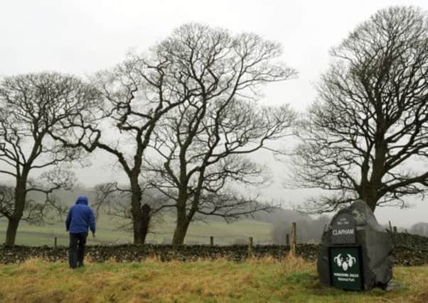 A walker at Clapham on the western edge of the Yorkshire Dales National Park, near to Lancashire. Picture: Gary Longbottom