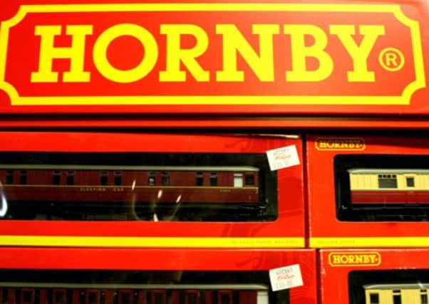 Hornby signalled progress in its attempts to recover from the woes caused by poor Olympics merchandise sales and supply chain problems.
