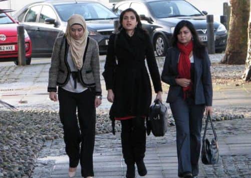Miriam (left), Umbareen (centre) and  Nishat Siddiqi (Right) , arriving at Swansea Crown Court