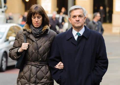 Former Energy Secretary Chris Huhne and his partner Carina Trimingham arrive at Southwark Crown Court.
