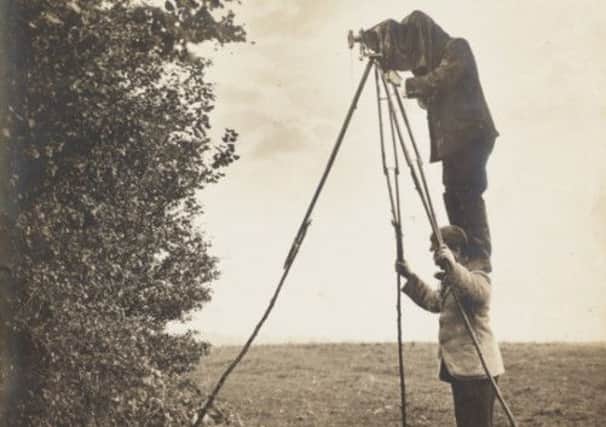 Richard and Cherry Kearton taking a photograph of a birds nest