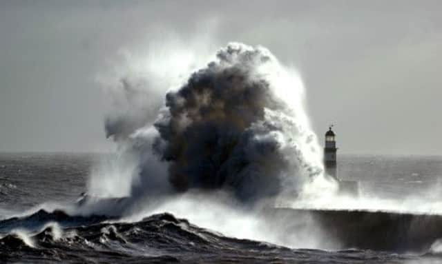 Gale Force winds from the North make spectacular pictures at Seahman harbor as they battered the seafront. Picture: Owen Humphreys/PA Wire