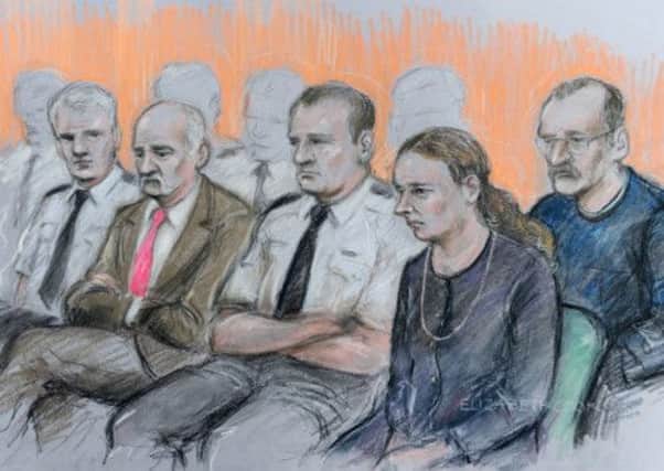 Mick Philpott (second from left) and wife Mairead (second from right) at Nottingham Crown Court along with Paul Mosley (right) ahead of their trial for the manslaughter of their six children in a house fire in Allenton, Derby.