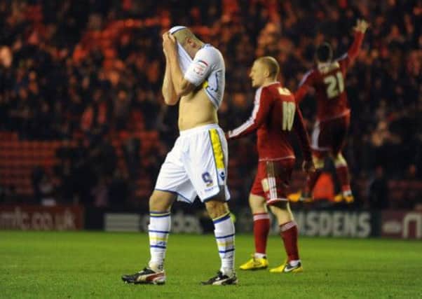SERIOUS BLOW: United striker Steve Morison is left dejected by his sides 1-0 defeat at Middlesbrough.