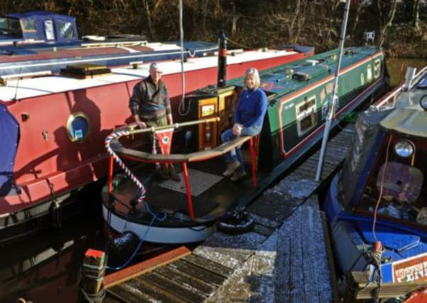 Don and Barbara Barker on their canal boathome at Strawberry Island Boatyard, Doncaster
