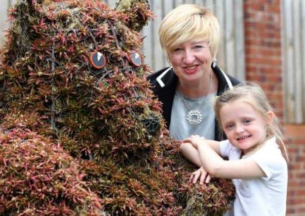 Sophie Bell from Kippax North School who won the competition to name the bear in Kippax with Pat Samy and Sue Biggs, below.
