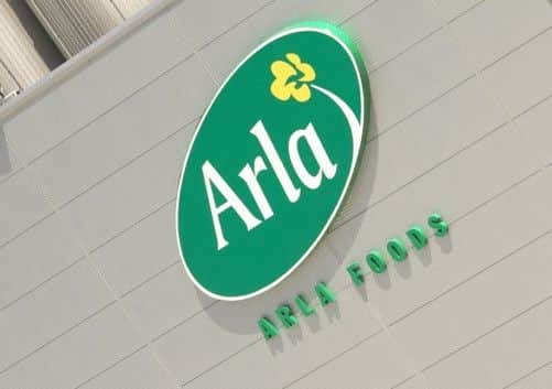 Arla defies squeeze on spending to deliver top results