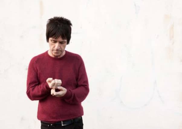 Johnny Marr, and below with The Cribs