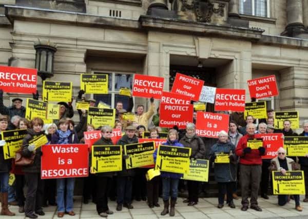 Protestors with banners outside the council officers in Harrogate earlier this month.