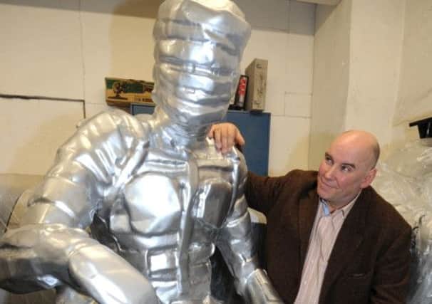 Artist Steve Mehdi with his Man of Steel in the Snuff Mill Body shop in Sheffield. Picture by Chris Lawton