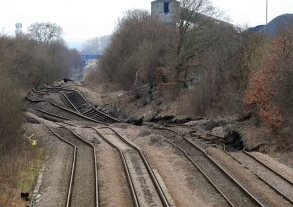 Twisted rail tracks as land slips from Hatfield Collery, Stainforth, Doncaster. Picture by Chris Lawton