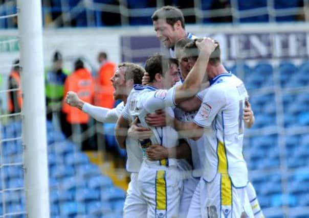 Stephen Warnock celebrates after scoring from the penalty spot