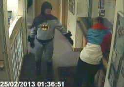 A real-life Batman apprehended a wanted criminal and took him into a police station to face justice.