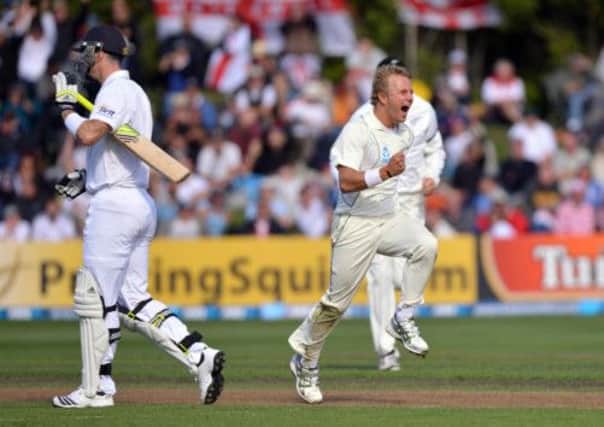 New Zealand's Neil Wagner (right) celebrates as England's Kevin Pietersen (left) leaves the field after getting out LBW first ball during Day Two