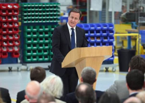 David Cameron during a visit to precision grinding engineers Kinetic Landis Ltd in Keighley