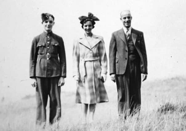 Gordon Fell (also below) with his parents Ethel and Richard