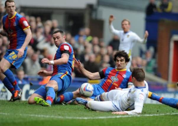 Last ditch defending blocks Leeds's Luke Varney from scoring against Palace at the weekend.
