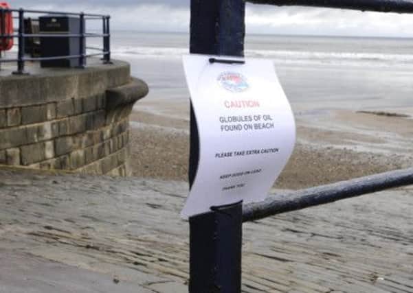 One of the warning signs posted along the sea front
