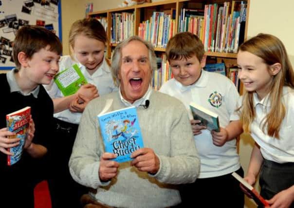 Actor and author Henry 'The Fonz' Winkler reading one of his books to pupils of Townfield Primary School, Doncaster
