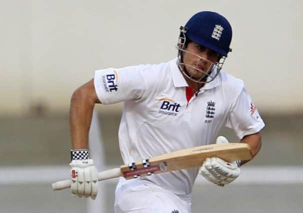 Alastair Cook runs between the wickets during a warm-up match against India A in Mumbai