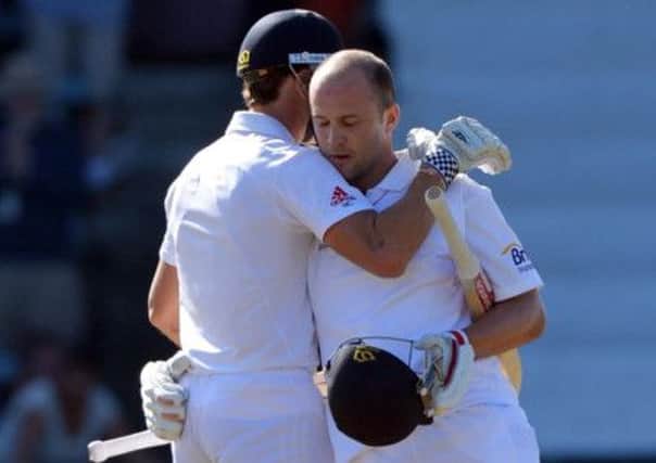England's Jonathan Trott (right) celebrates scoring 100 not out with Nick Compton. (Picture: Anthony Devlin/PA Wire).