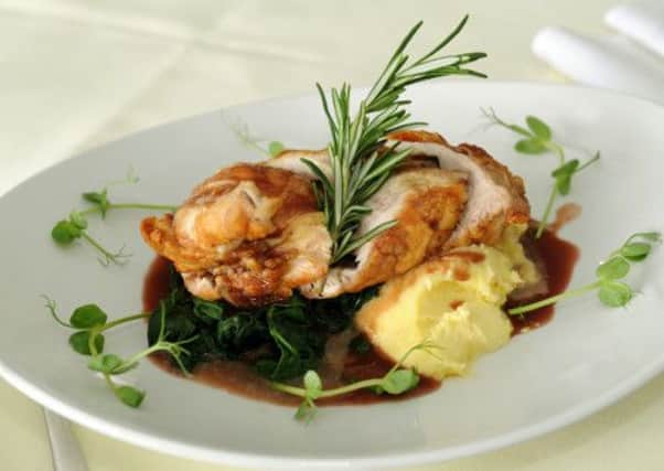 A  main course of Stuffed Chicken Fillet, chicken fillet stuffed with toleggio cheese, rosemary, peppers and oyster mushrooms. Served with wilted spinach, mashed potato and a red wine sauce