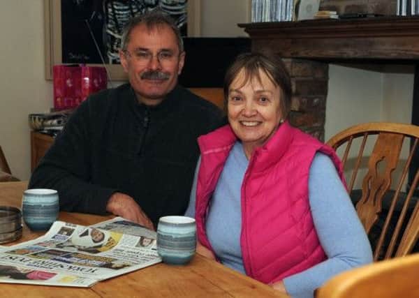 John and Angela Foster in their kitchen