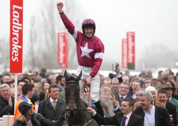 Jockey Davy Russell and owner Michael O'Leary (right) celebrate victory with Sir Des Champs