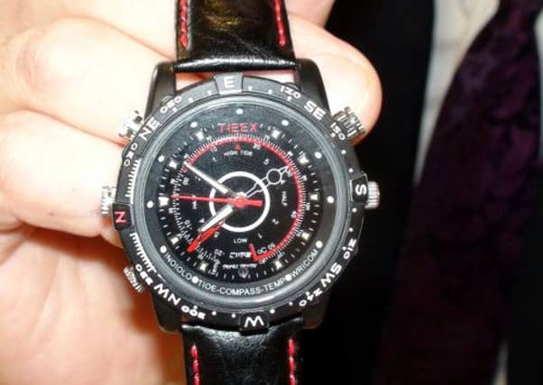 The hi-tech wristwatch used by family GP Dr Davinderjit Bains (below).