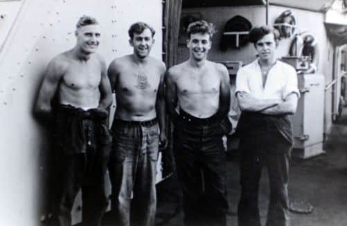 Ernest Schofield, second right.