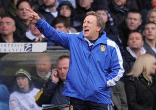 Neil Warnock on the touchline during the clash with Huddersfield Town.