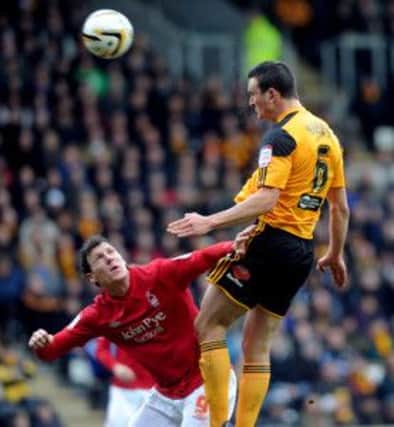Hull City's Jack Hobbs, heads the ball above Nottingham Forest's Darius Henderson.