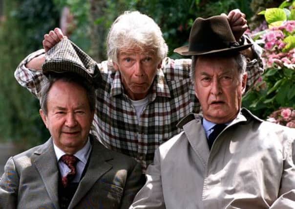 Frank Thornton (right) with Tom Owen (centre) and Peter Sallis in Last of The Summer Wine. Below, with Are you Being Served? co-star Wendy Richard.