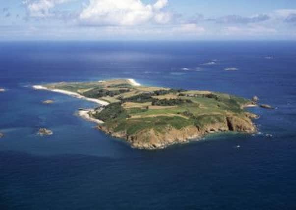 Herm Island and The White House Hotel, below.