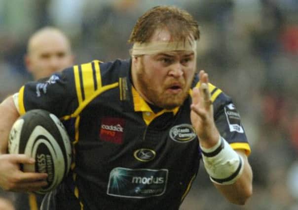 Former Leeds prop Tommy McGee has snubbed Rotherham to stay on at Wharfedale and Leeds in a dual capacity.